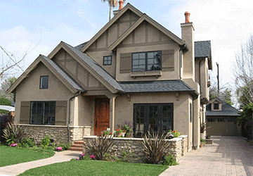Front view of a two-story home with an interesting placement of gables